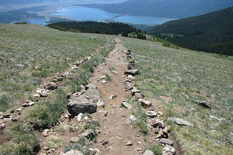 Single track trail, refilled with rocks to keep hikers on the single track in the middle.