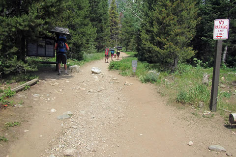 Backpackers leaving Death Canyon Trailhead