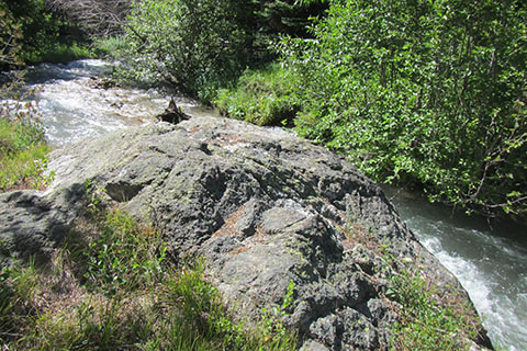 Boulder next to the creek