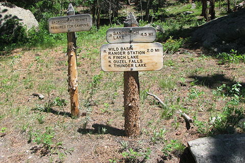 trail mileage and directional signs