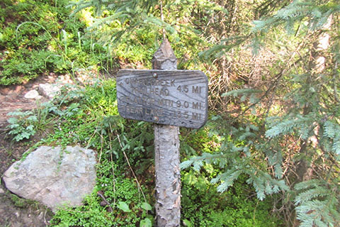 Onahu Creek Trail junction sign