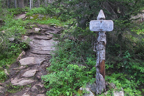 July campsite sign and side trail that leads to the campsite