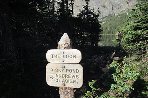 The Loch destination sign on the shore of the lake