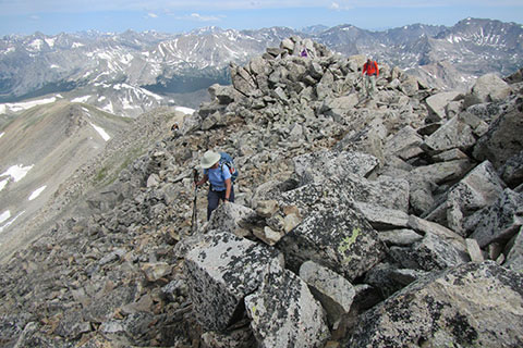 Hikers crossing the ridge