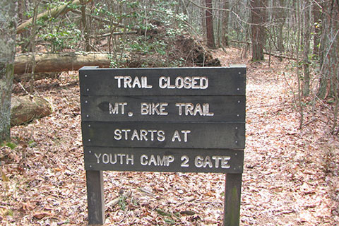 Passing a mountain bike trail closed sign